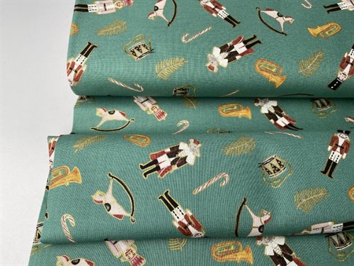 Patchwork stof - fine jule dekorationer på mørk mint bund